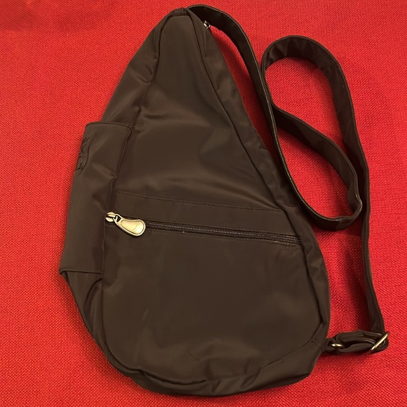 Healthy Back Bag Handbags - Healthy Back Bag, black, cross body bag. Lots of pockets inside and out.